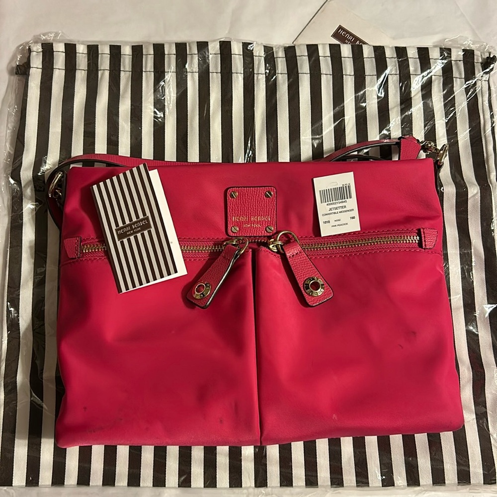 Henri Bendel Jetsetter convertible messenger bag. Pink. Dust bag & lock included